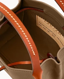 Dooney & Bourke Ready For the Getaway | Textured Leather^Oncour Twist Tiny Full Up